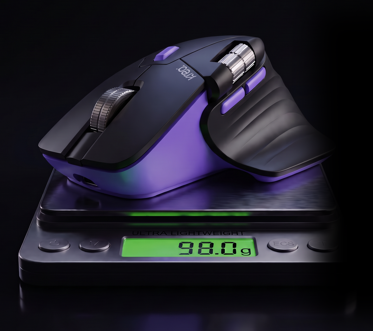 The Kreo Axis mouse on a scale reading its 98 g weight