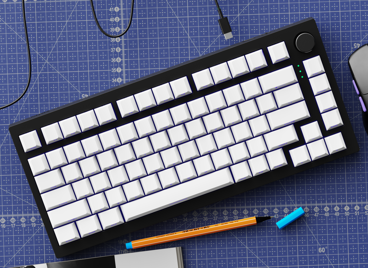 Detachable USB-C cable connected to a Kreo Swarm 75 Phantom Black keyboard