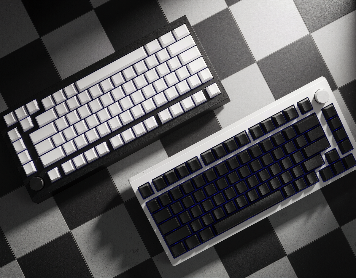 Kreo Swarm 75 Phantom Black and White keyboards showing the 75% compact layout