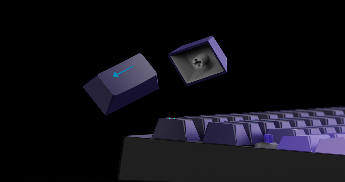 Two Swarm 75 keycaps floating above the board, one turned to show its stem