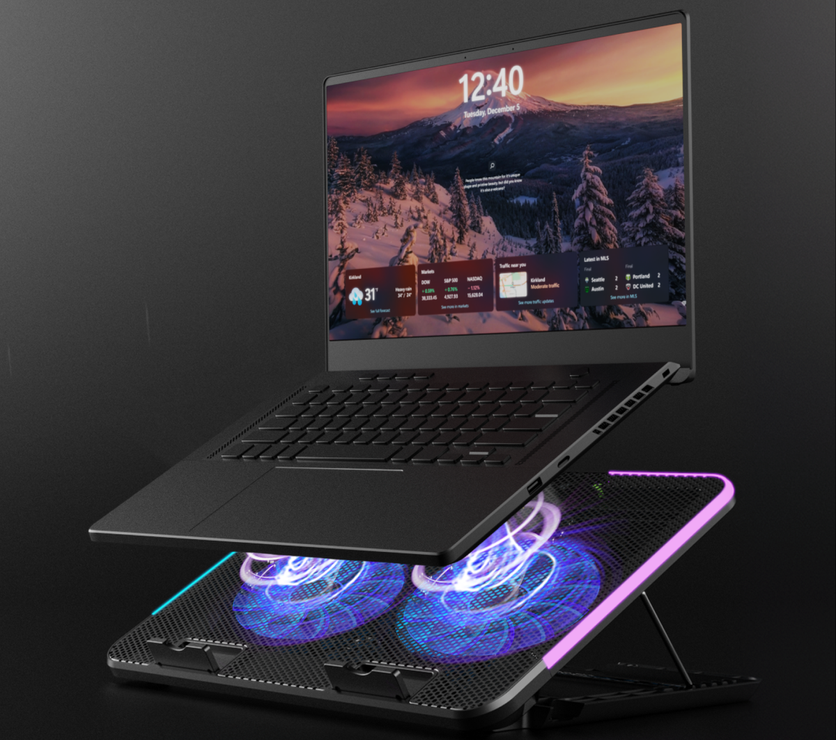 Laptop sitting on the Taiga cooler with both fans glowing